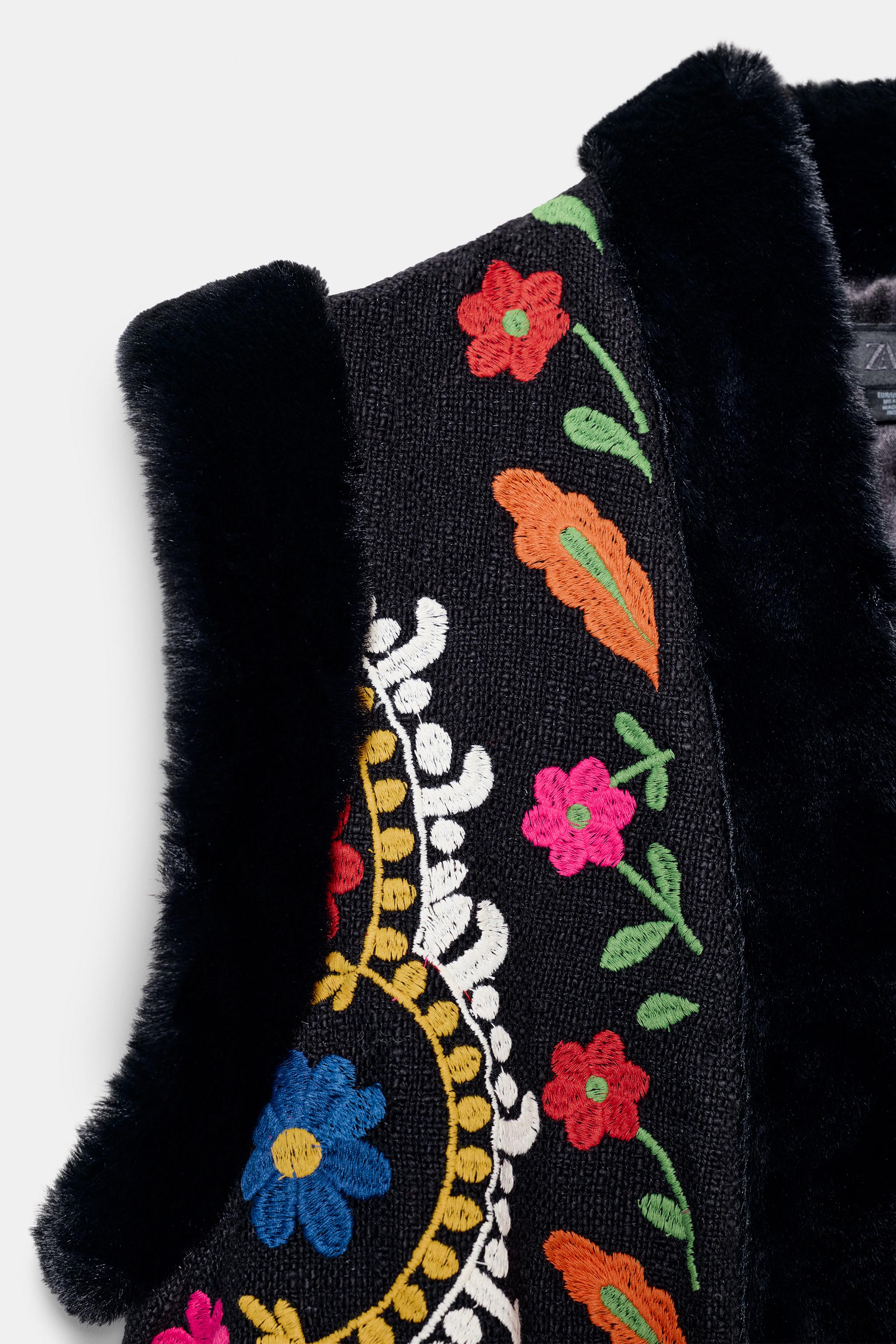 CONTRASTING EMBROIDERED FAUX FUR VEST
